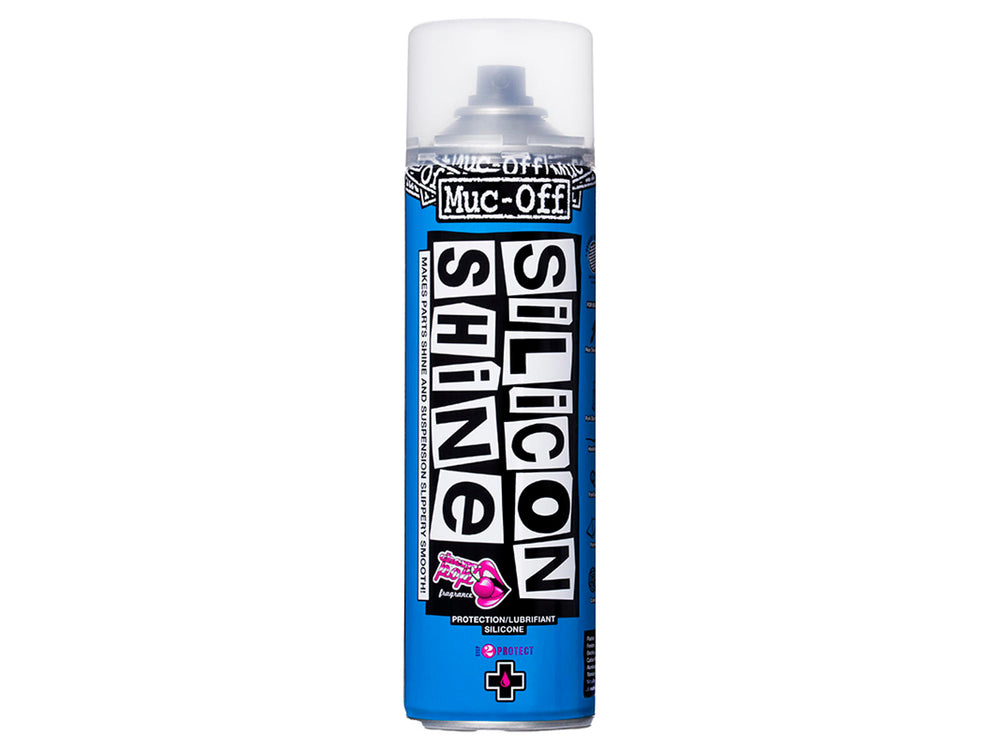 Flaske med Mucoff Silicon Shine, et skinnende plejemiddel til cykler og motorcykler, der giver en glat og beskyttende overflade.