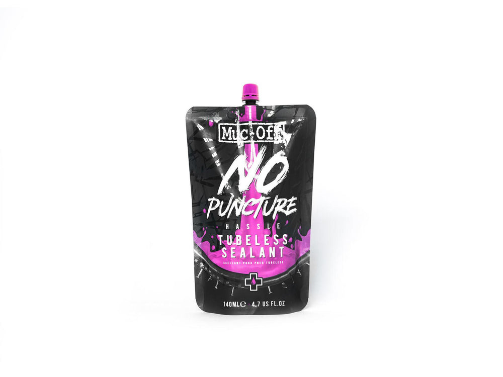 Mucoff MTB Tubeless sealant 140ml flaske med grøn væske, designet til at forsegle tubeless cykeldæk og forhindre lufttab.