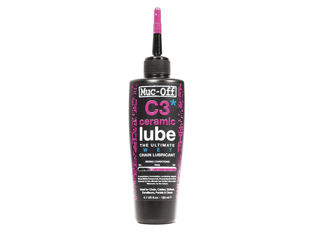 Flaske med Mucoff Wet Lube - C3 Ceramic, en cykelolie designet til at give langvarig smøring under våde forhold.
