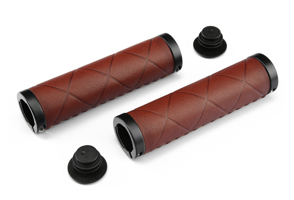 Håndtagsæt fra Bikepartner i ægte læder (brun). Eksklusivt håndtagssæt str. 2 x 130 mm. Låsering i begge ender af håndtagene.