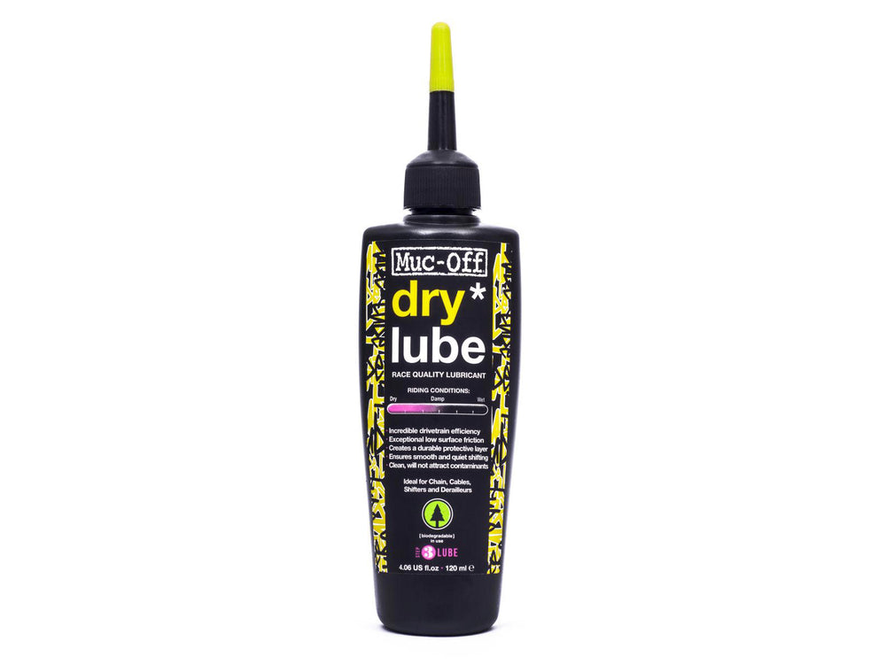 Flaske med Mucoff Dry Lube, en tør smøremiddel til cykler, placeret på en neutral baggrund.