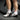 Hvid M3002 sneakers med en moderne og minimalistisk design, placeret på en lys overflade.