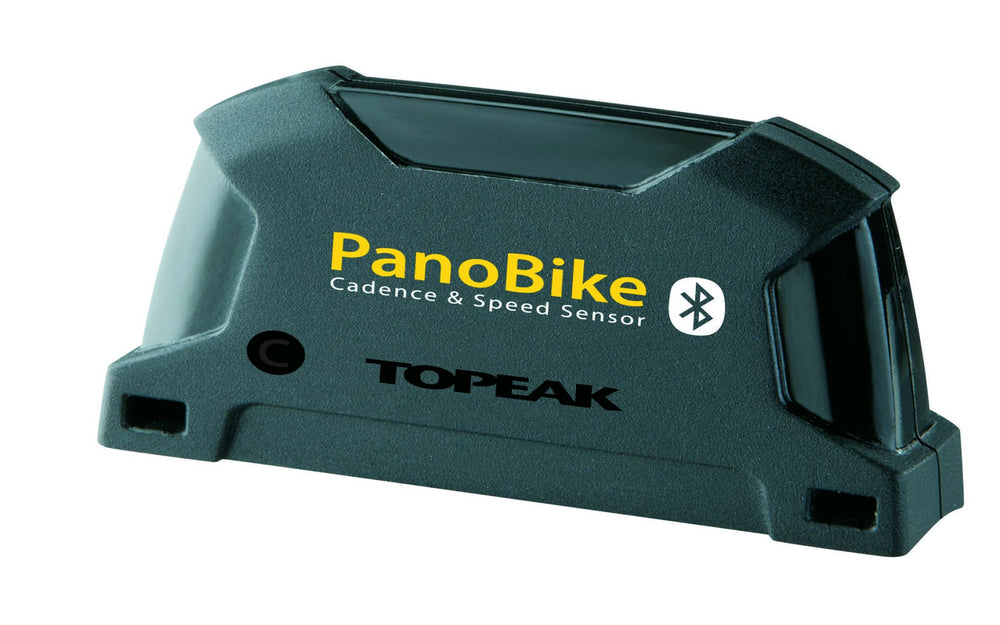 Kadencemåler Panobike fra Topeak, der viser en cyklist, der måler pedalomdrejninger med en digital skærm, designet til at forbedre cykeltræning og ydeevne.