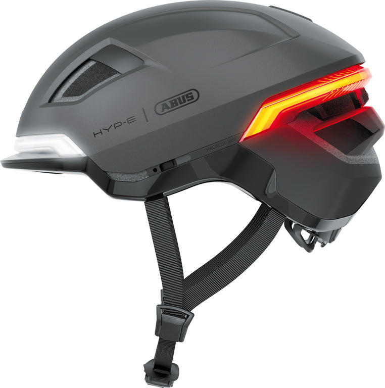 Hjelm Hyp E Volcano Titan: En moderne cykelhjelm i titanfarve med aerodynamisk design og ventilationsåbninger.