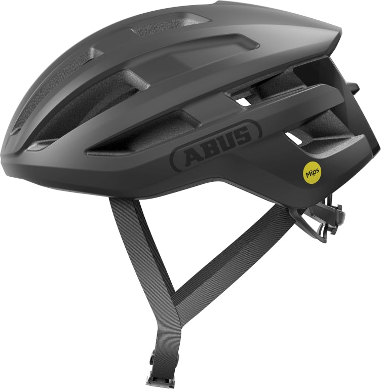 Sort cykelhjelm Abus PowerDome MIPS med aerodynamisk design og ventilationshuller, set fra siden.