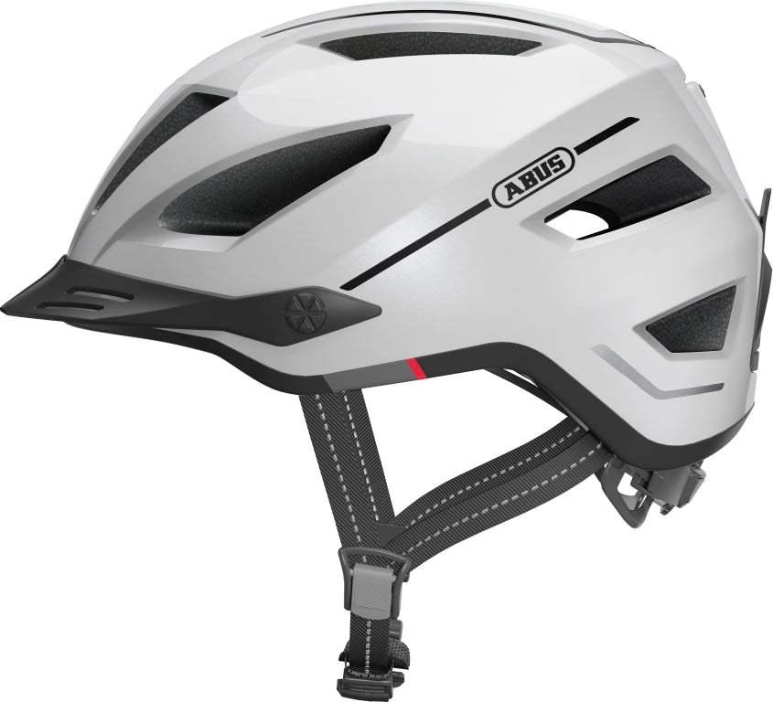 Cykelhjelm Abus Pedelec 2.0 el-cykelhjelm i perlehvid farve, set fra siden med justerbar rem og ventilationshuller.