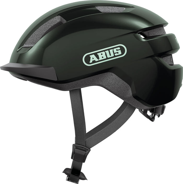 Cykelhjelm Purl Y i mosgrøn farve, elegant design med justerbar rem og ventilationshuller, perfekt til sikker cykling.
