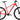 Mat rød Principia Evoke A3.9 cykel stående på en græsplæne, med fokus på ramme og design.