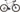 Principia Gravel 22Titan SRAM Force AXS 1x12sp Titanium cykel i et stilrent design, stående på en grusvej.